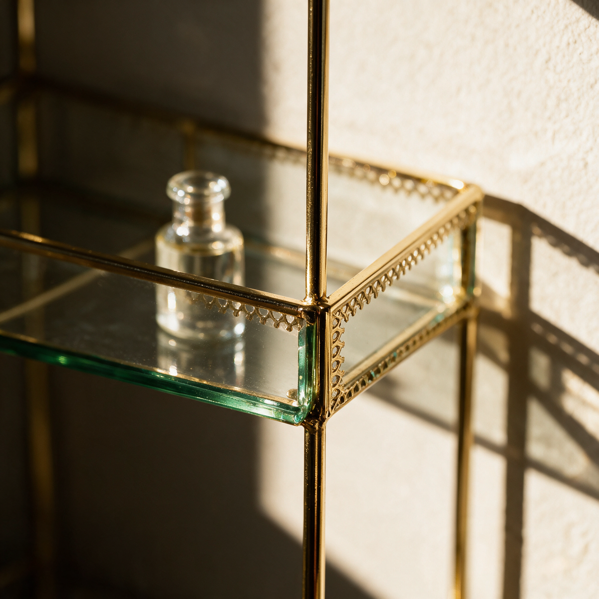 Macro view of a glass tier seated into its slim gold upright.