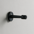 Fenwick Wall-Mounted Cylinder Door Stop — Black