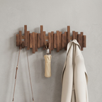 Fernwood wood wall coat rack, hero shot, light concrete-grey background