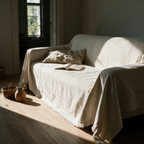Cove woven cover draped and tucked over a three-seater sofa