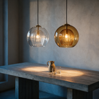 Clear and amber Bramble pendants hung side by side