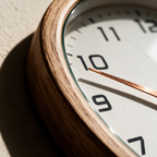 Close-up of the timber rim, glass lens and copper hand