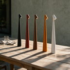 Tarn shown in all five colours on an outdoor table