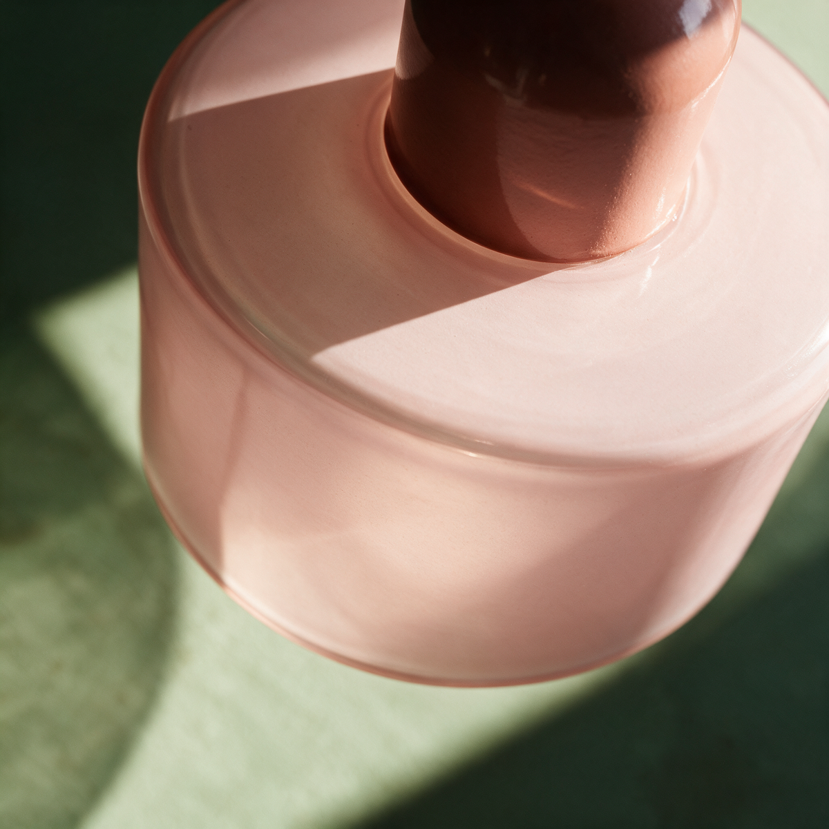 Close-up of the coloured collar meeting the drum glass shade