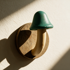 Close-up of a painted cap, pale stem and timber backplate