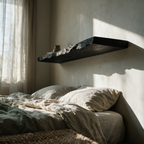 The shelf mounted above a linen bed showing its concealed mounting