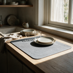 Elm quick-dry drying mat on an oak bench with draining stoneware