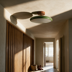 The unlit fitting on a plaster ceiling showing its semi-flush drop