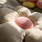 Macro detail of the seam where two corduroy petals meet the raised round centre disc.