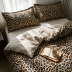 Overhead view of the leopard print bedding set with the duvet turned back at one corner.